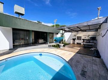 6c998fba7c95a5bbfaec4fb46e99cd0e19c065cb · Casa reformada à venda na praia da Enseada no Guarujá I Omega Imoveis