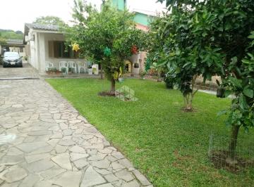 652262_i7qXap79nn55b6_652262671fe9b68523c.jpg · 3 casas escrituradas em um terreno à venda no bairro Belém Novo.