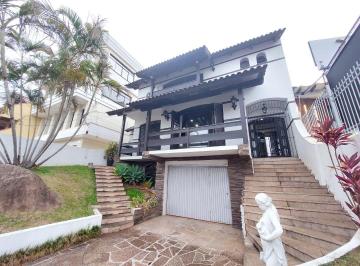 Casa · 382m² · 5 Quartos · 4 Vagas · Casa com 5 dormitórios para alugar, 382 m² por R$ 7.000,00/mês - Tristeza - Port