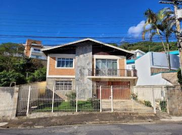 ad29b2a6c3c96f8d3ba3e8254b9a26a73db9c728 · Casa com 4 dormitórios à venda, 314 m² por R$ 1.200.000,00 - Jardim dos Estados - Poços de Caldas/MG
