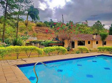 Foto 01 · Imperdível casa à venda em Mairiporã-SP, bairro Rio Acima, com 4 quartos, 2 suítes, 3 salas, 4 banhe