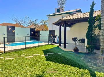 Casa · 240m² · 4 Quartos · 2 Vagas · Conheça sua nova Casa Mobiliada à Venda – 4 Dormitórios, 2 Suítes, 380m do Mar.