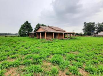 Foto 01 · Sitio com 3000m² Casa estilo colonial em condomínio fechado - Águas Claras - Viamão