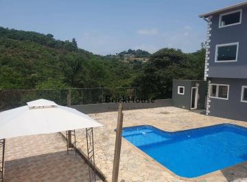 ea779140b45bb138f7e48b96e39b991397ce1bb4 · Chácara com 4 dormitórios, 1080 m² - venda por R$ 950.000,00 ou aluguel por R$ 5.000,00/mês - Pousad