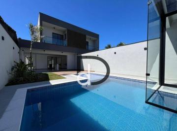 c73021f402976b9080591304ceb75fb81143a9e9 · Casa com 5 dormitórios à venda, 229 m² por R$ 1.950.000 - São Lourenço - Bertioga/SP