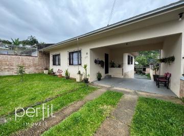 Foto 01 · Sobrado a venda com três quartos no bairro Iririú - Joinville/ SC