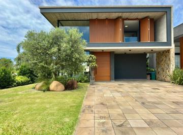 733150.jpg · Casa em Condominio 4 dormitorios - Bairro Atlantida