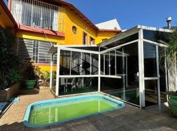 655452_iy2Zu327s5366Yx7664_655452673b809e6626e.jpg · Casa com 3 dormitórios à venda, 300 m² por R$ 1.200.000 - Vila Ipiranga - Porto Alegre/RS