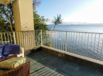 12 · Casa com vista mar e 3 suítes em Cacupé