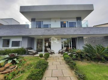 469559_i1S8W09WO3ZT69_469559653ac21aeb911.jpg · Casa com 5 suítes em Atlântida, quase divisa com Capão da Canoa/RS.