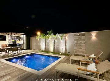 uy3hfs2njnhmwm2mtgzmwyw_md · Casa à venda no condomínio Village La Montagne, com 03 suítes mobiliada
