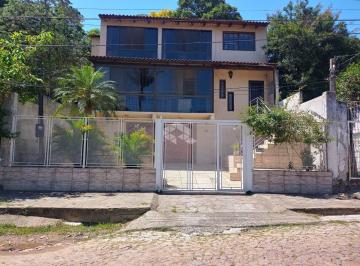 656179_i3Mh58N6FFmK6p_6561796740cff767f23.jpg · Casa a venda no bairro Nonoai