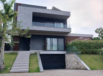 1 · Excelente casa de alto padrão com 4 suítes no Rio tavares