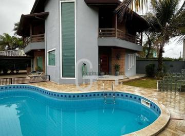 c51d9f1a42b1e8a4f081298d5d6ee859a230b41b · Casa com 4 dormitórios à venda, 447 m² por R$ 2.250.000,00 - Bougainvillee I - Peruíbe/SP