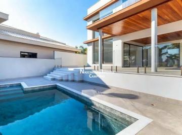 a05f73fa2649e5dab461e3ee7f378a36196d2dbb · Casa com 4 suítes à venda, 509 m² por R$ 5.900.000 - Condomínio Residencial Jatibela - Campinas/SP