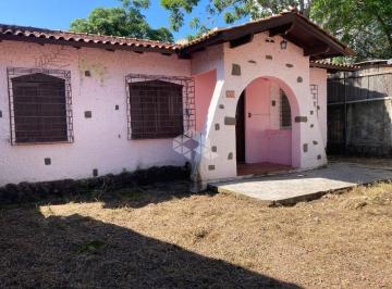 656828_i38b5_6568286762fd3bcd903.jpg · Casa antiga, charmosa, em ótimo terreno e localização. Bairro Tristeza