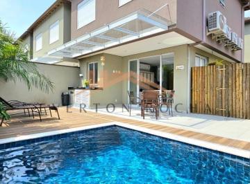 Imagem do Imóvel · Casa em condomínio exclusivo na praia de Juquehy, com 3 suítes, piscina privativa e desing clean