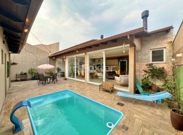 e7b74f8c-c516-4343-9950-3cd237e2bc2c.jpg · Casa, 3 dormitórios, 166 m², em Estância Velha