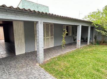 Casa · 2 Quartos · 2 Vagas · Casa a venda por R$320.000,00. 2(dois) dormitórios sendo 1(uma) suíte - Canoas/RS