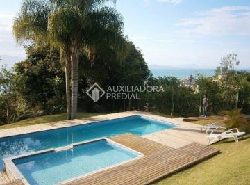 13 · Auxiliadora Predial vende apartamneto com vista para o mar em Jurerê.