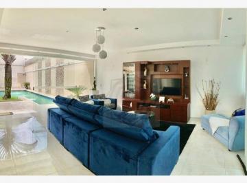 e0e5ac64a8d2e4859ad9f3eec50173592b6ba4fa · ESTUDA PERMUTA!!! Casa com 5 suítes à venda, 476 m² por R$ 2.690.000 - Alphaville 05 - Santana de Pa