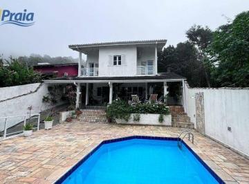 2c52b41c87481136a35c3242e840cb37b3e2b097 · Casa com 5 dormitórios à venda, 341 m² por R$ 2.800.000,00 - Guaecá - São Sebastião/SP