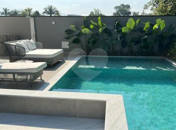 Área de Serviço · Casa com 6 quartos à venda em Riviera - SP