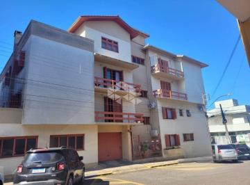 672449_iyowp47_6724496758f5ba68577.jpg · Apartamento com 3 dormitórios e 2 vagas de garagem no centro de Vacaria!