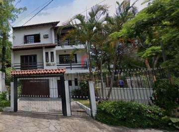 Casa · 280m² · 4 Quartos · 2 Vagas · Casa de 4 dormitórios no bairro Vila Jardim