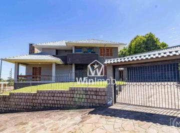 5f7c3f3f009738d1aca90a48fc39db0ab1946412 · Casa com 3 dormitórios à venda, 258 m² por R$ 1.275.000,00 - Jardim Planalto - Porto Alegre/RS