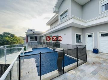 Foto 01 · Casa de luxo no Condomínio Terras de Santa Teresa em Vinhedo, com 4 suítes, 3 salas e 350m² de área