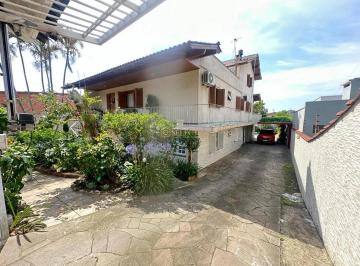 Casa · 384m² · 5 Quartos · 4 Vagas · Sobrado com Terraço e Sacada em Canoas