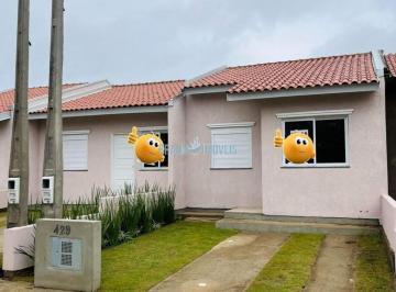 Foto 01 · Casas de dormitórios com pátio. Prontas para morar e na planta em Gravataí/RS. Entrada parcelada.