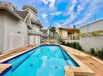 642622_i5xUae51IgAEmZyh3j52_64262266ec377dae252.jpg · À venda, casa com 570 m²,  3 dormitórios, sala de jogos, sala de cinema, piscina, vaga para 6 veícul