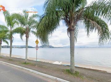 641445_i2688ie_64144566d7d0350fc35.jpg · TERRENO Á VENDA DE 660,00 M² EM CONDOMÍNIO FECHADO COM VISTA PARA A BAÍA