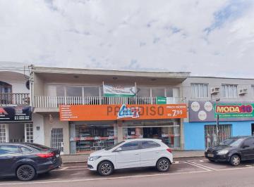af39448532a7cccf8731816f3b24629c9340e73b · Prédio comercial embaixo e residencial em cima
