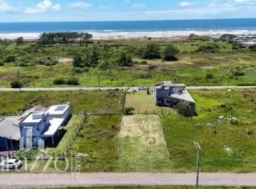 Apartamento · Terreno em Tramandai 