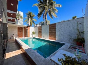 05412badbf5215861ec90f14f668d3be0dff9120 · Casa com 6 dormitórios à venda, 167 m² por R$ 2.500.000,00 - Canto do Forte - Praia Grande/SP