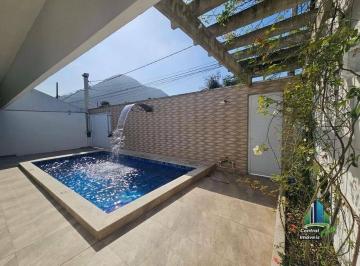 c775e3a1a241de805a1c457cfe8f8cd57f3c4ae7 · Casa com 3 dormitórios à venda, 194 m² por R$ 3.300.000,00 - Canto do Forte - Praia Grande/SP