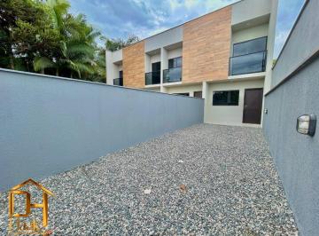Foto 01 · Sobrado geminado com 2 suítes e 2 vagas de garagem no bairro Rio Bonito