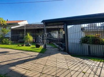 Foto 26 · Casa à Venda em Porto Alegre-RS - Casa com 6 Quartos, 3 Suítes, 2 Salas e 3 Vagas de Garagem