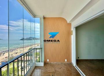 1253711ee2cad9845a9cae39d34eef24679fad6d · Apartamento frente mar à venda na praia das Pitangueiras no Guarujá I Omega Imoveis