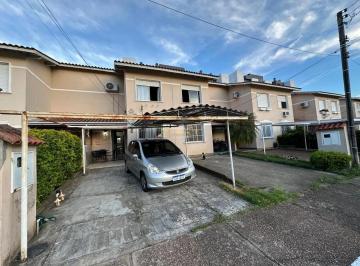 Casa · 100m² · 3 Quartos · 3 Vagas · Sobrado à venda em Canoas - Igara Residence, com closet, churrasqueira e portaria 24h