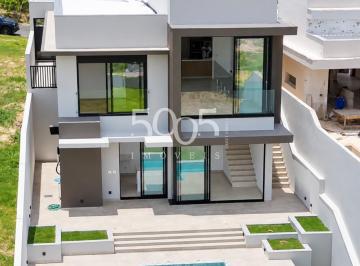 Foto 35 · Casa em construção à venda no condomínio Saint Paul com 268m² de área construída e 564m² de área tot