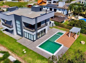 7f69b399f523d561ceca19a5bc934ae7cc769004 · Casa com 4 suítes à venda, 438 m² por R$ 4.000.000