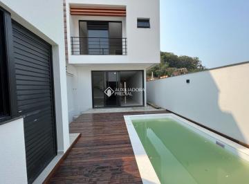 378085_iXU05l578lU2vT5O8k9e_378085631ce541ebac7.jpg · Casa em Camboriú, com 3 dormitórios