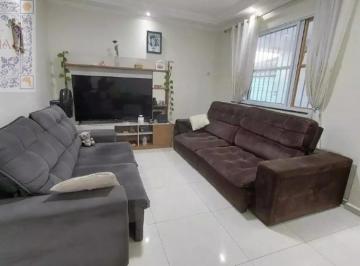 Foto 01 · Casa sobreposta baixa para venda com 2 suítes e 2 vagas na Aparecida em Santos / SP