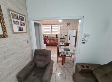 678668_i3l1LeU6ZzE_67866867a4b5c287dc7.jpg · Casa de alvenaria em rua tranquila no Sarandi