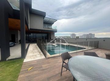 e9284d3c56e39d8e345e6e5a59f4797c85c1232a · Casa com 3 dormitórios à venda, 430 m² por R$ 3.950.000,00 - Condomínio Residencial Colinas do Parat