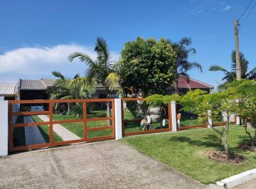 CA0100_MAR-1111709757485190.jpg · Excelente casa a venda na Praia Paraíso em Torres/RS. Com amplo pátio. Agende sua visita!